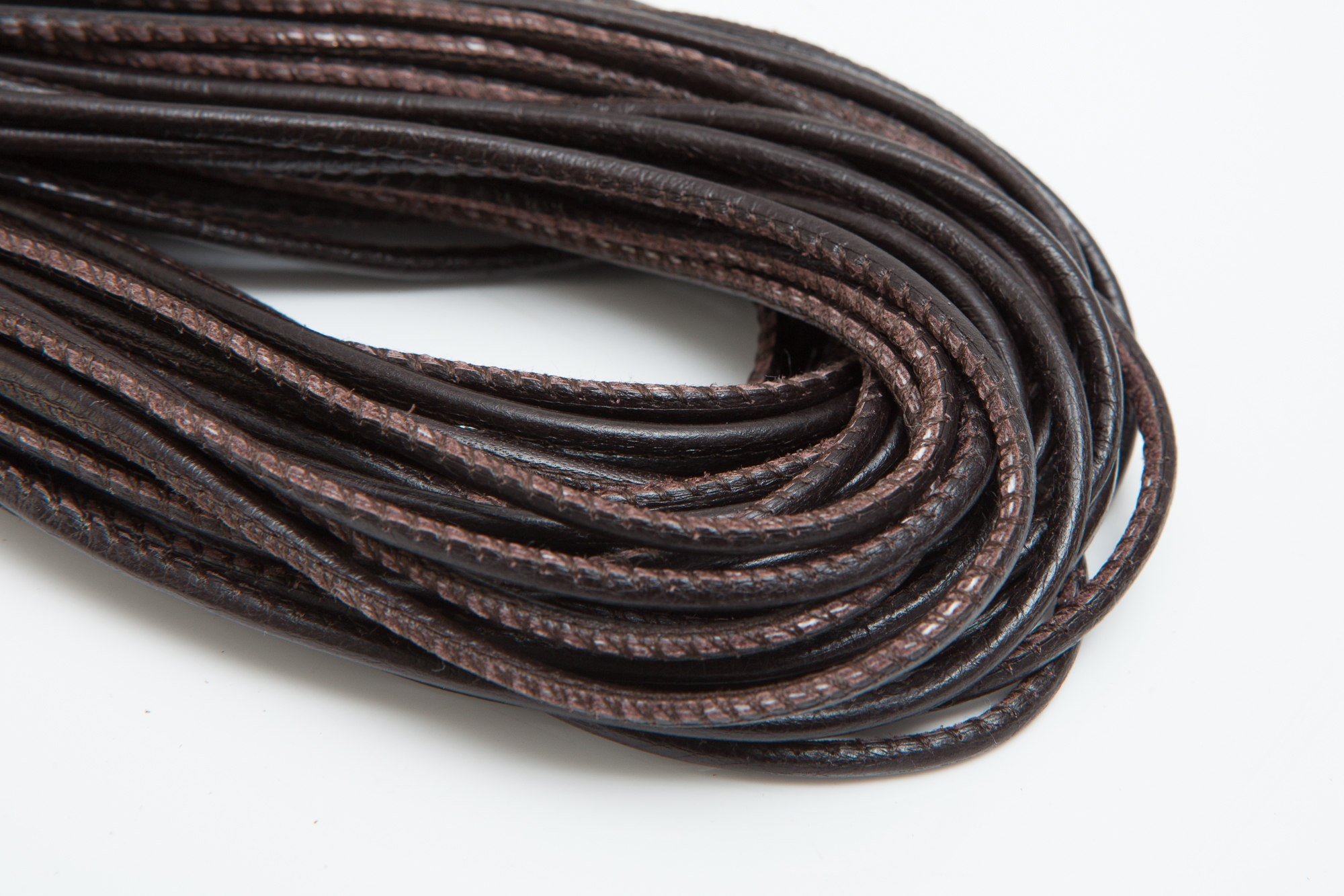 Lederschnur Rund gesäumt 2,5 mm - Braun. Länge: 2 m