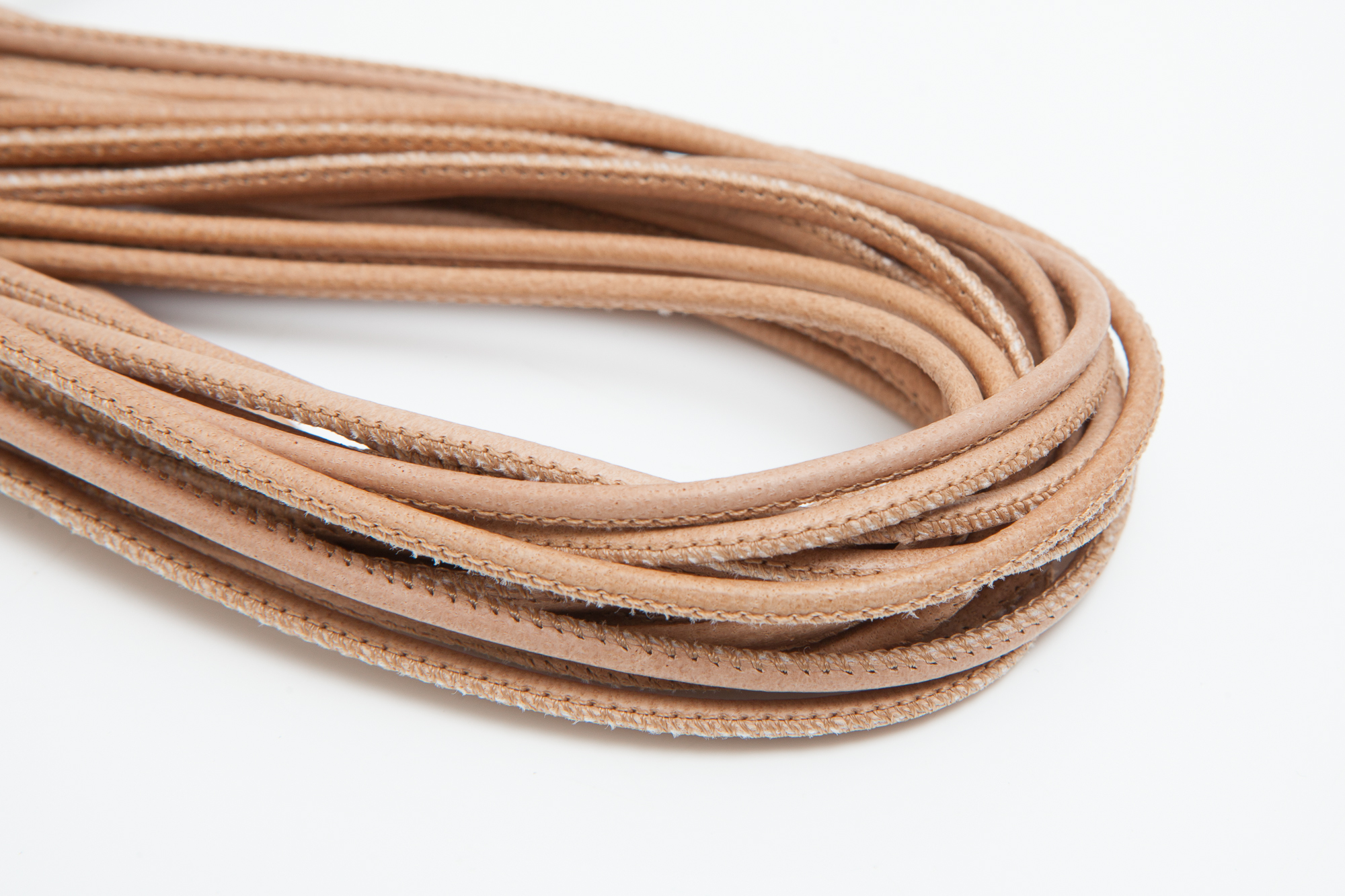 Lederschnur Rund gesäumt 2,5 mm - Natur. Länge: 10 m